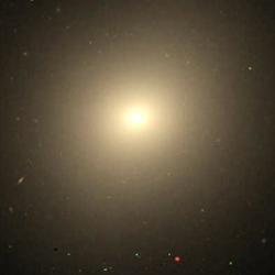 Galaxy NGC 1549, seen today and 13 billion years ago