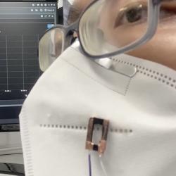 Fibre sensor attached to face covering