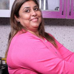 Woman with obesity washing food