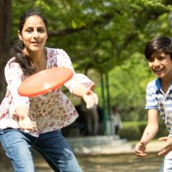 Family playing frisbee