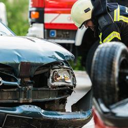 Firefighters at the scene of a car accident