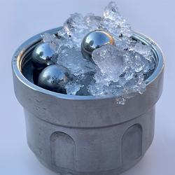 Part of the set-up for creating medium-density amorphous ice: ordinary ice and steel balls in a jar (not amorphous ice)