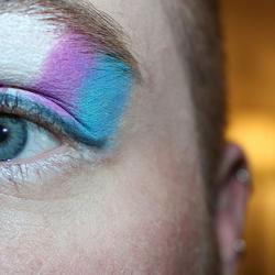 Woman with transgender flag make-up