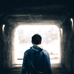 Man standing in a subway