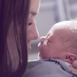 Woman and newborn baby