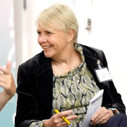 Two people talking at a public dialogue workshop