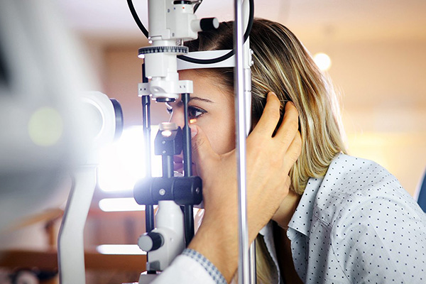 Checking eyesight in a clinic.