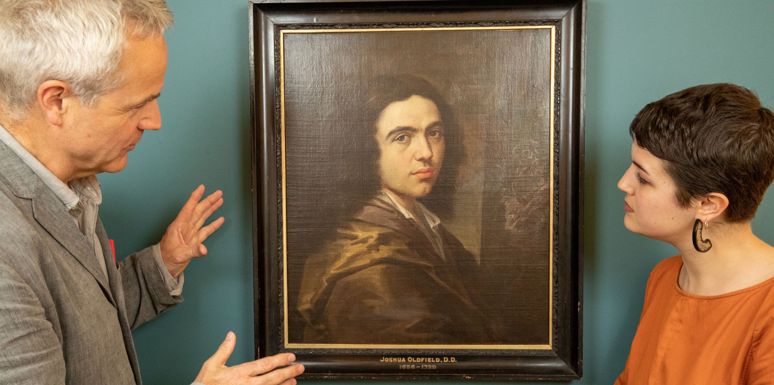 'Artist: Unknown' curators Andrew Nairne and Eliza Spindel at Kettle's Yard with Portrait of a Gentleman (oil on canvas, c.1660s).  Christ's College. Photo: University of Cambridge / Nick Saffell