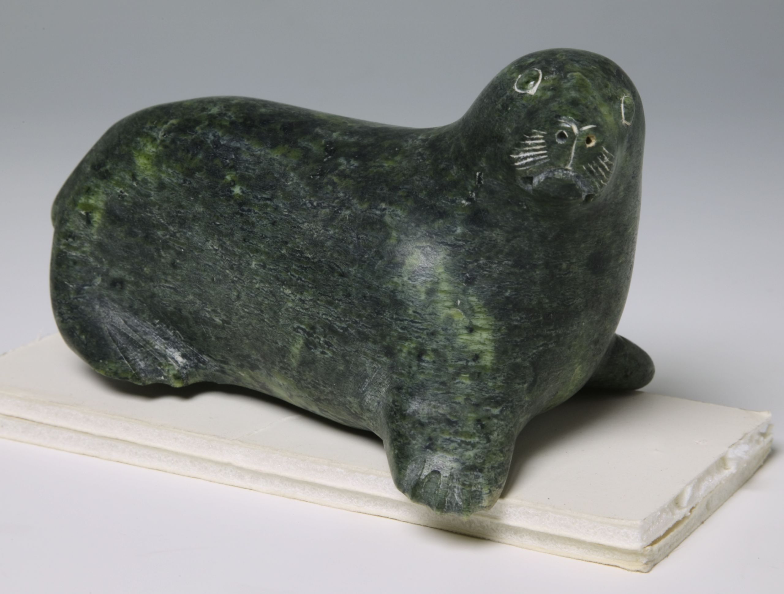 Walrus carving (Green serpentine, Canada, before 1966). The Polar Museum