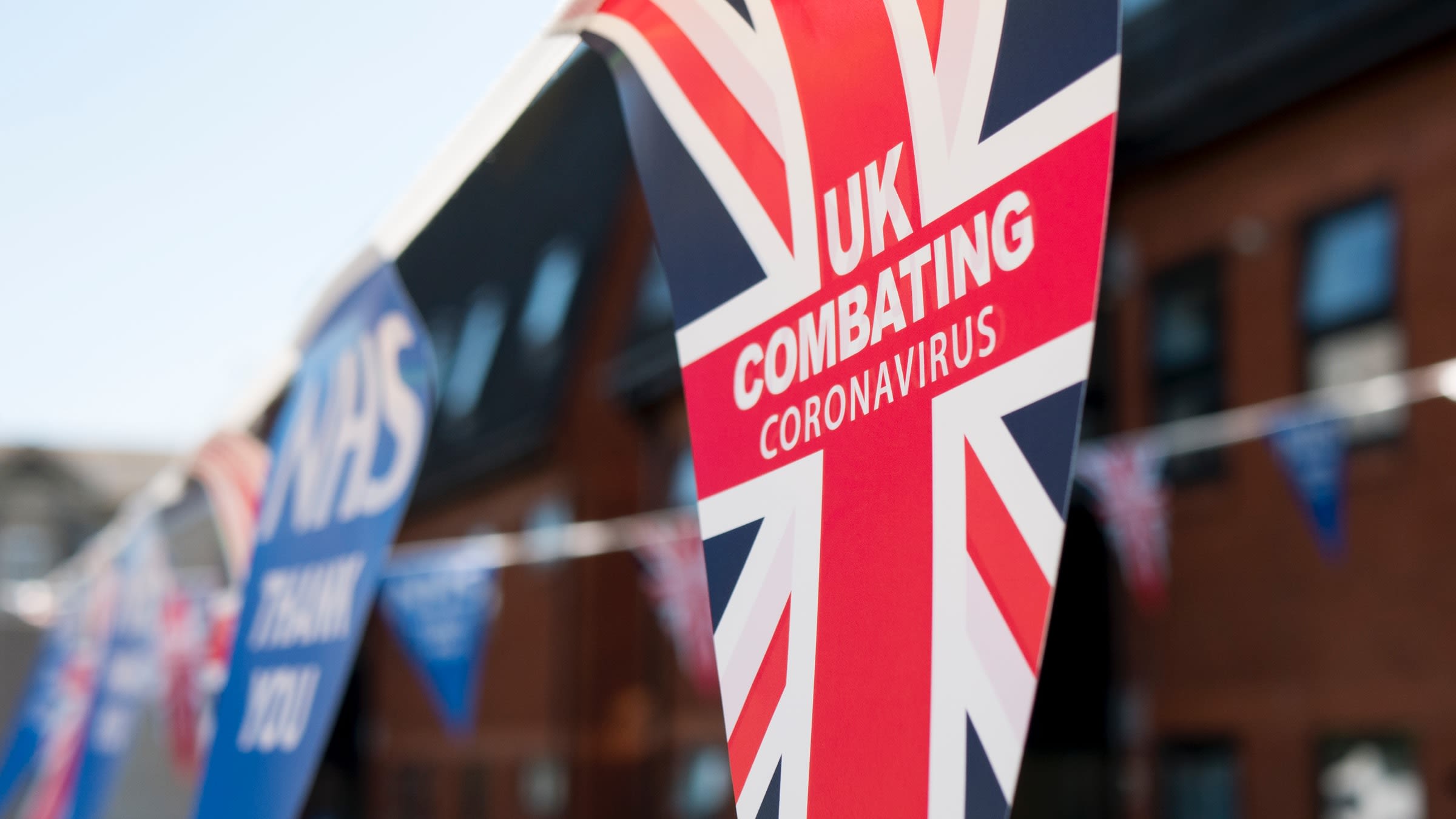 Bunting that reads UK combatting coronavirus