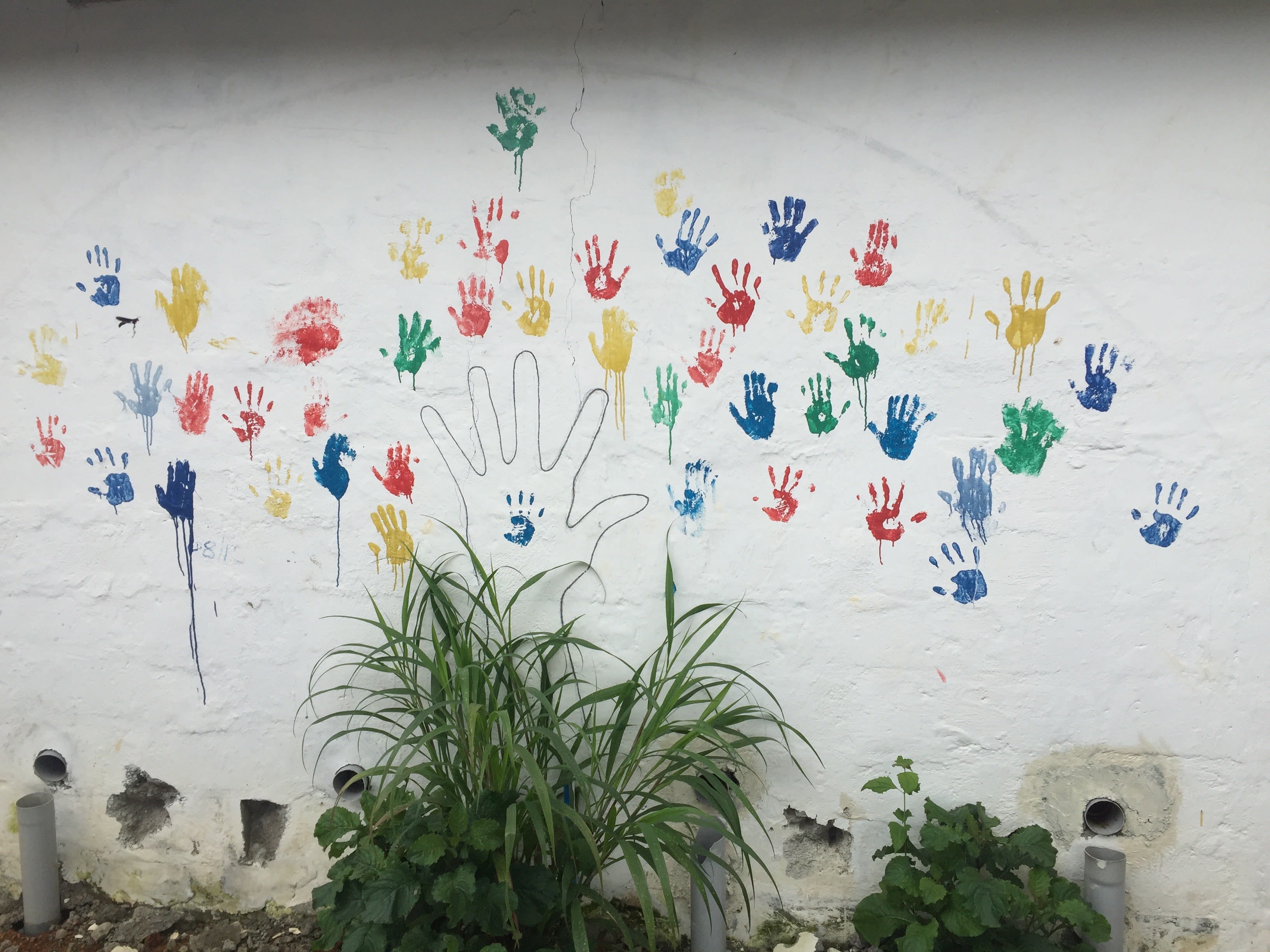 Hand prints are from Ebola survivors