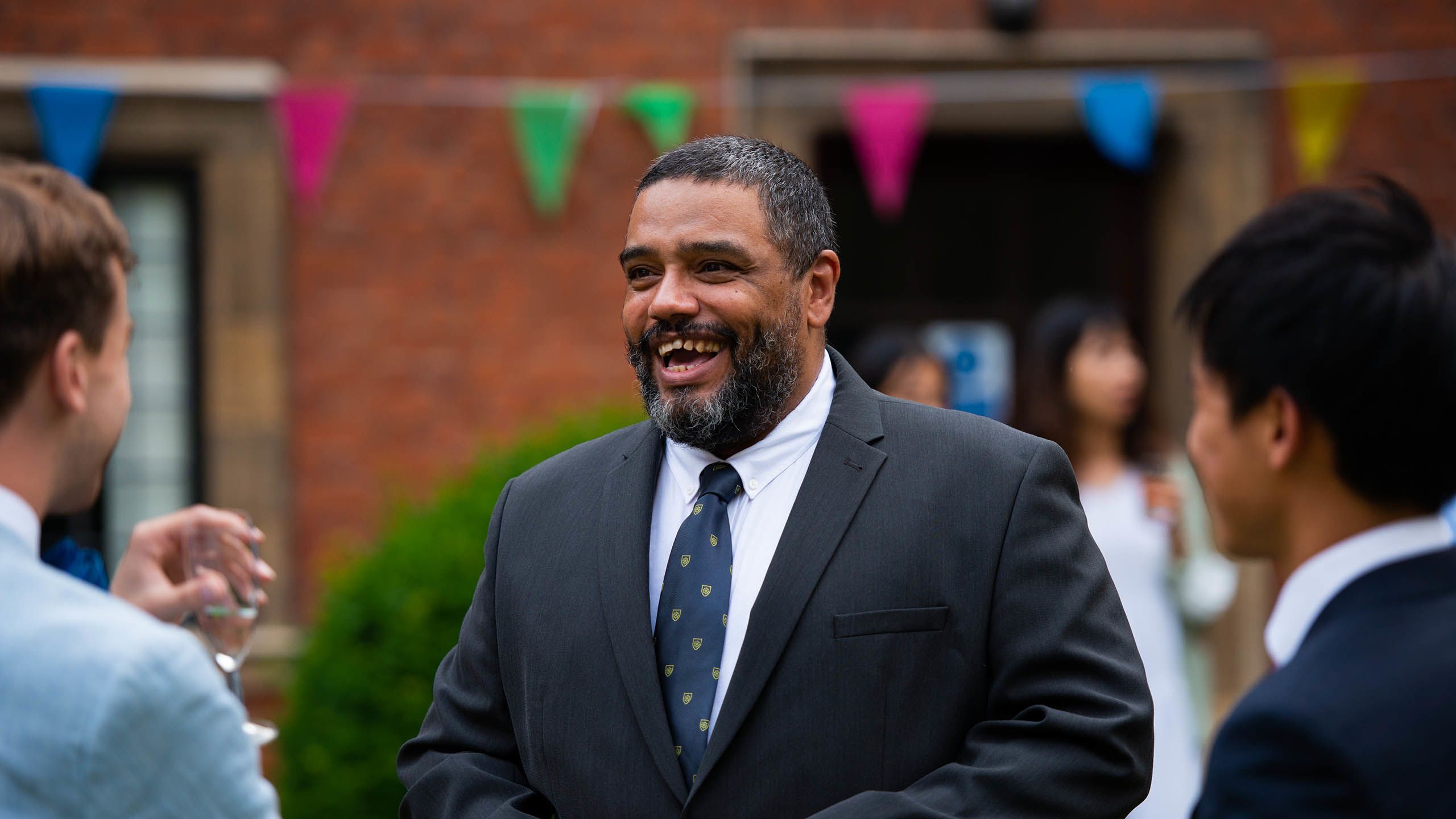 Malik Al Nasir at a garden party at St Catharine's College. Credit Tobia Nava