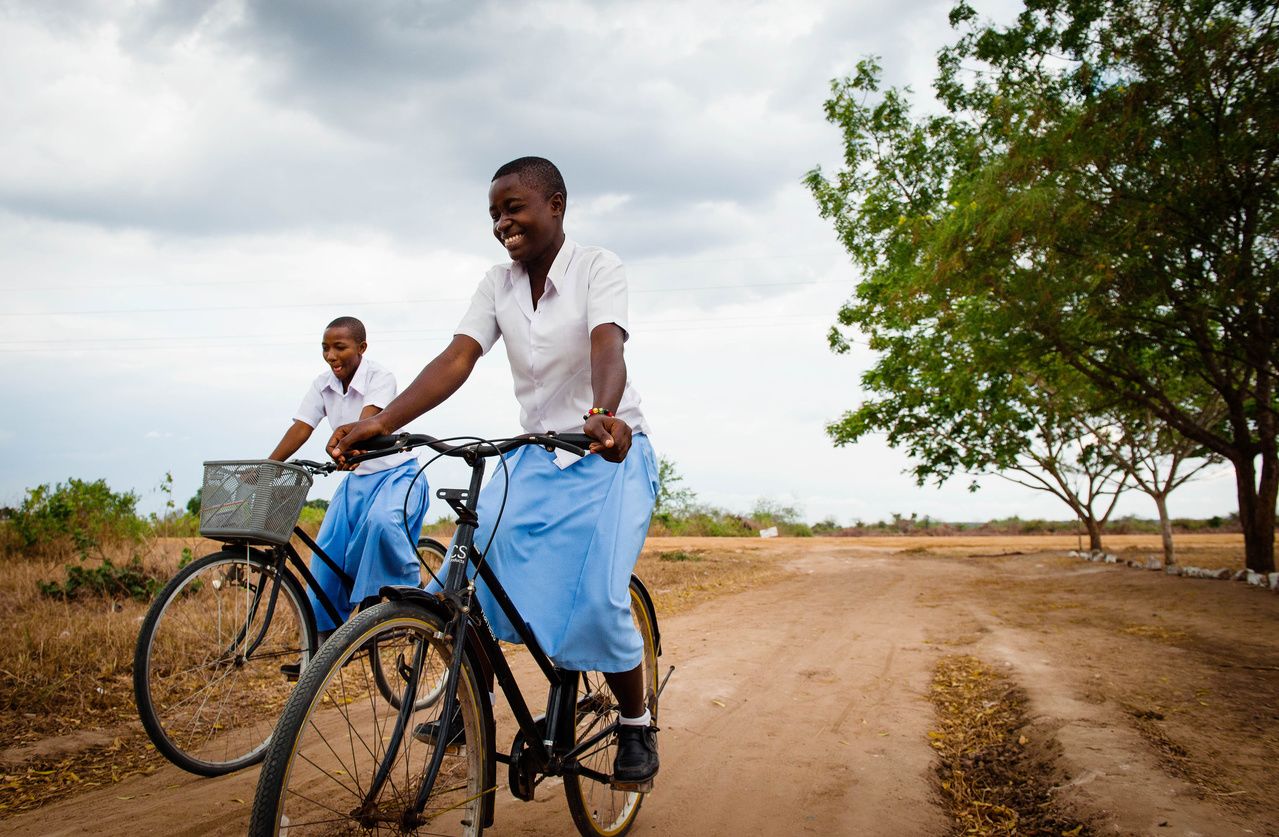 School girls riding bicycles