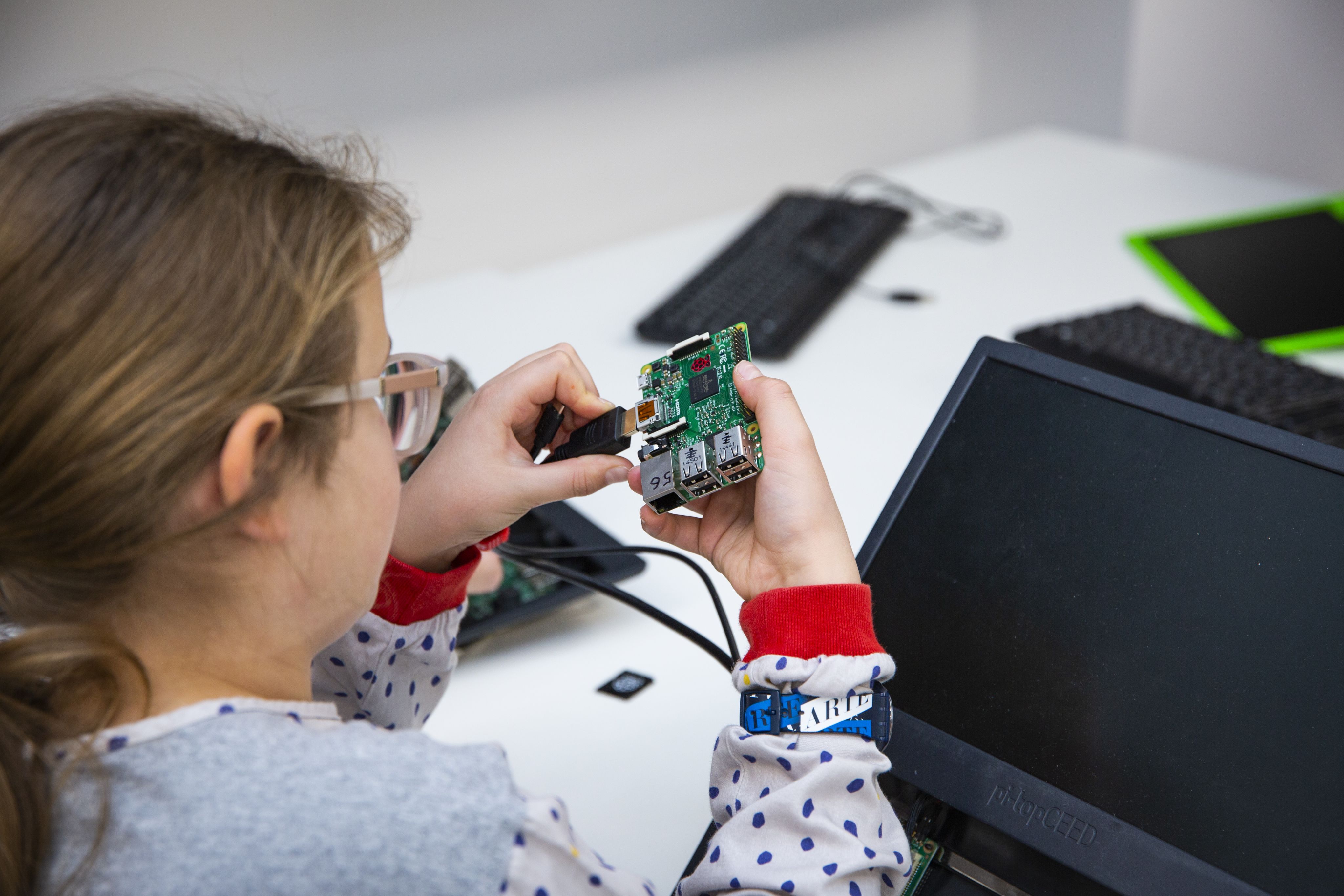 Young person working on a Raspberry Pi. Credit: Raspberry Pi