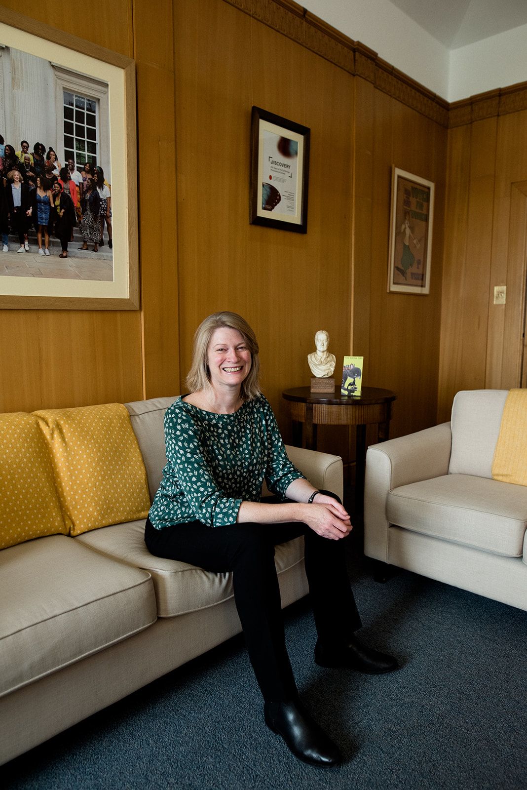 Dr Jessica Gardner, University Librarian and Director of Library Services, seated in her office, smiling.,