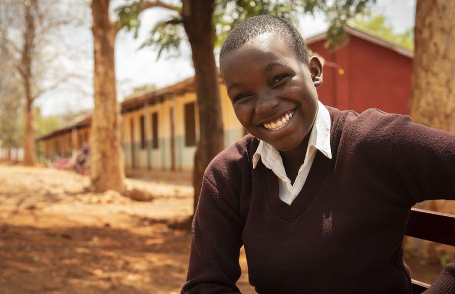 Secondary student Hanipha is supported at school by Learner Guide Sophia. Morogoro, Tanzania