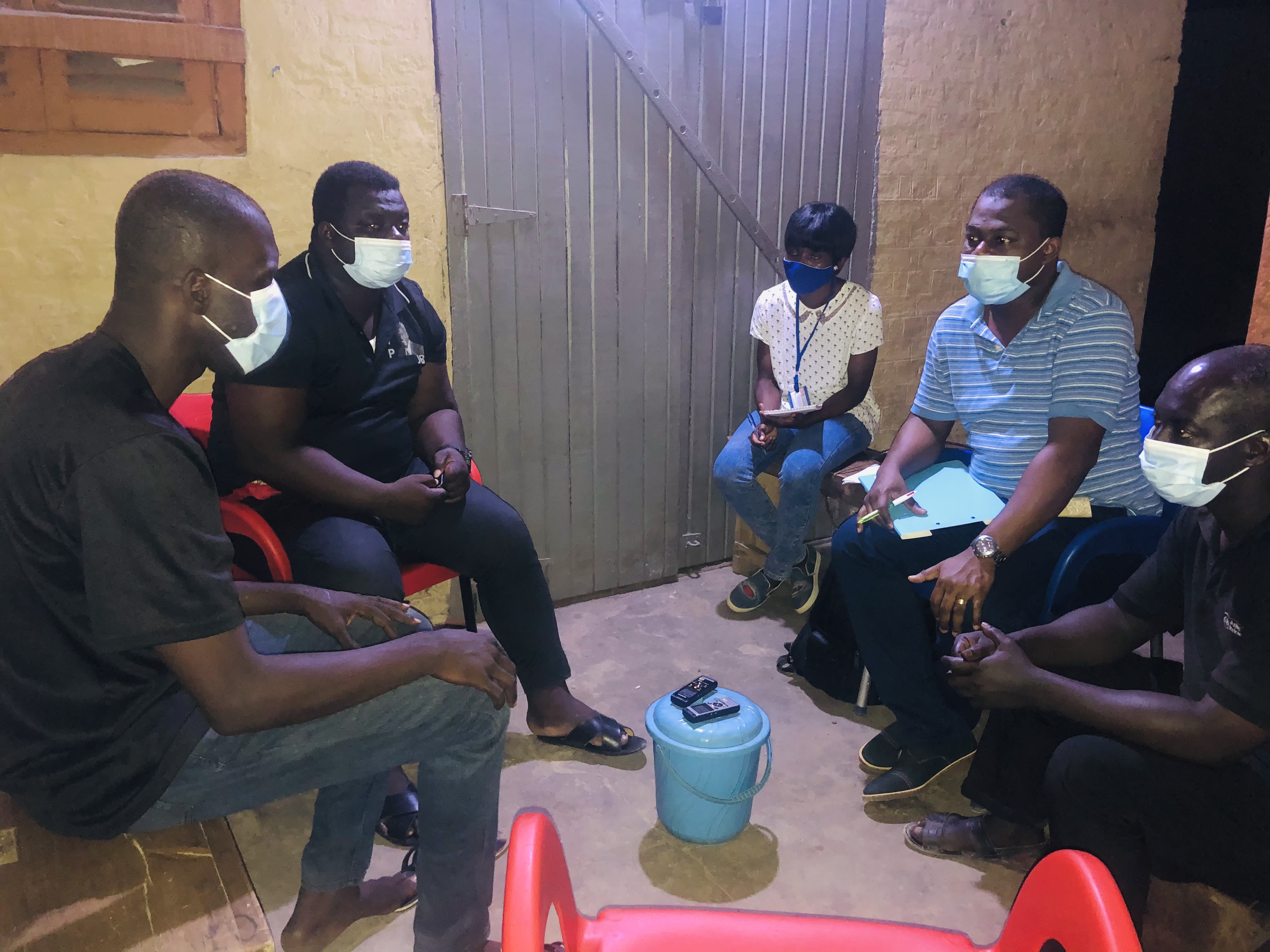 Fathers sitting in circle