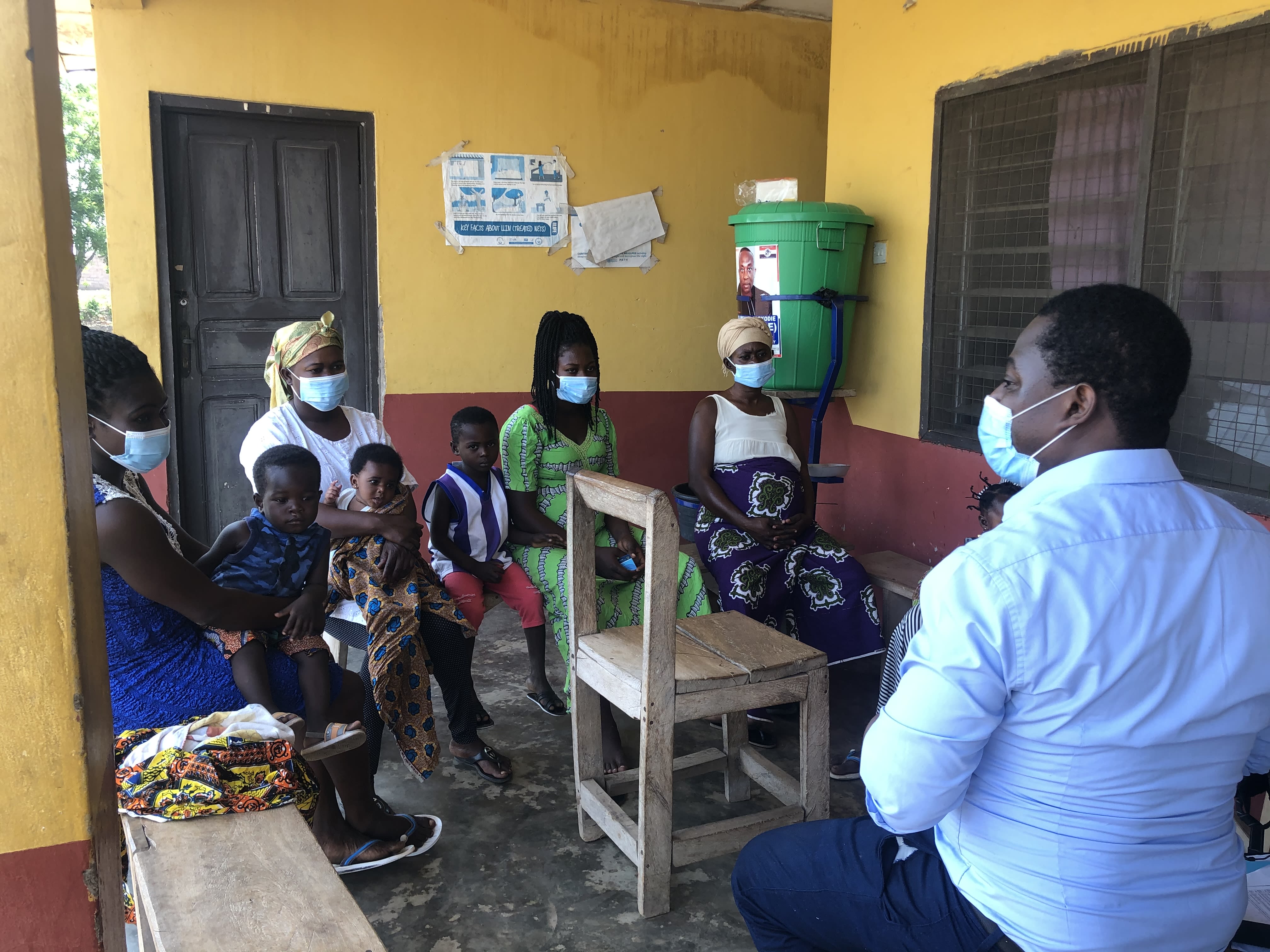 Researcher chatting to parents