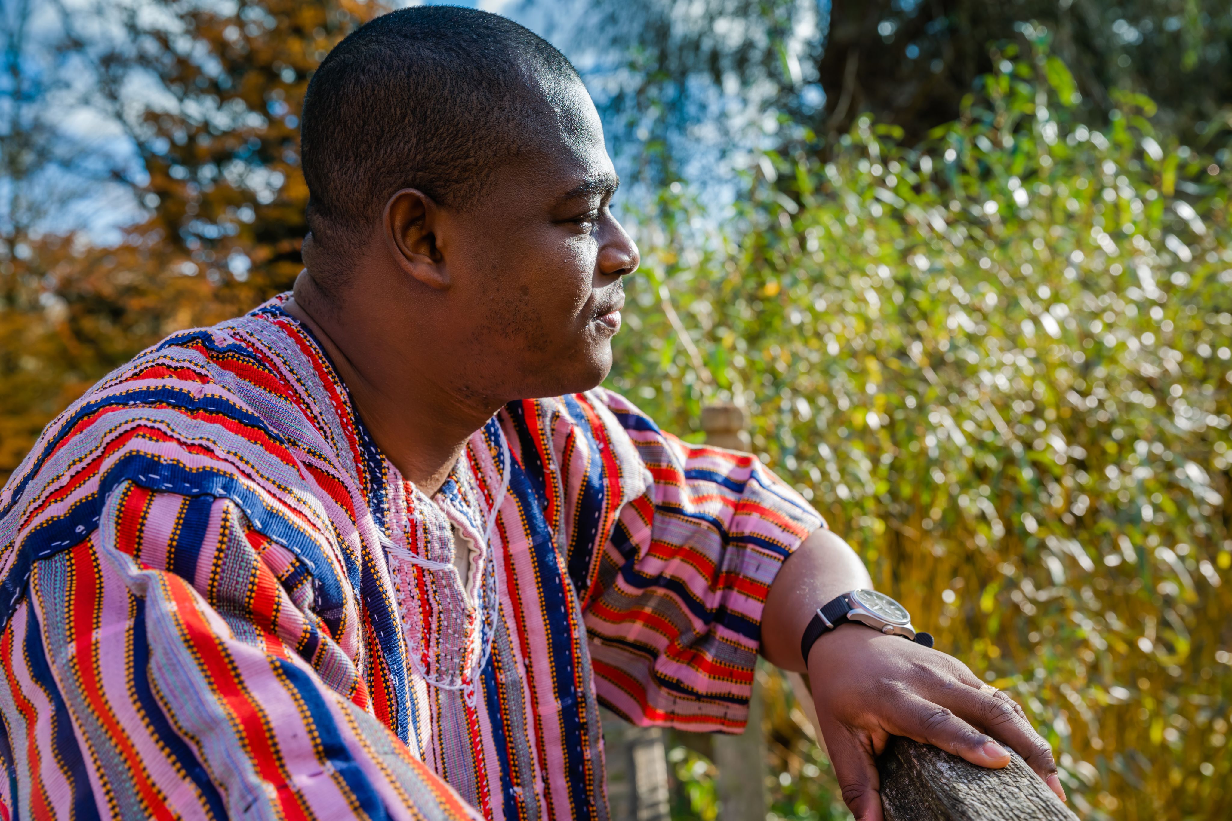 Kwabena Kusi-Mensah in the gardens at Darwin College