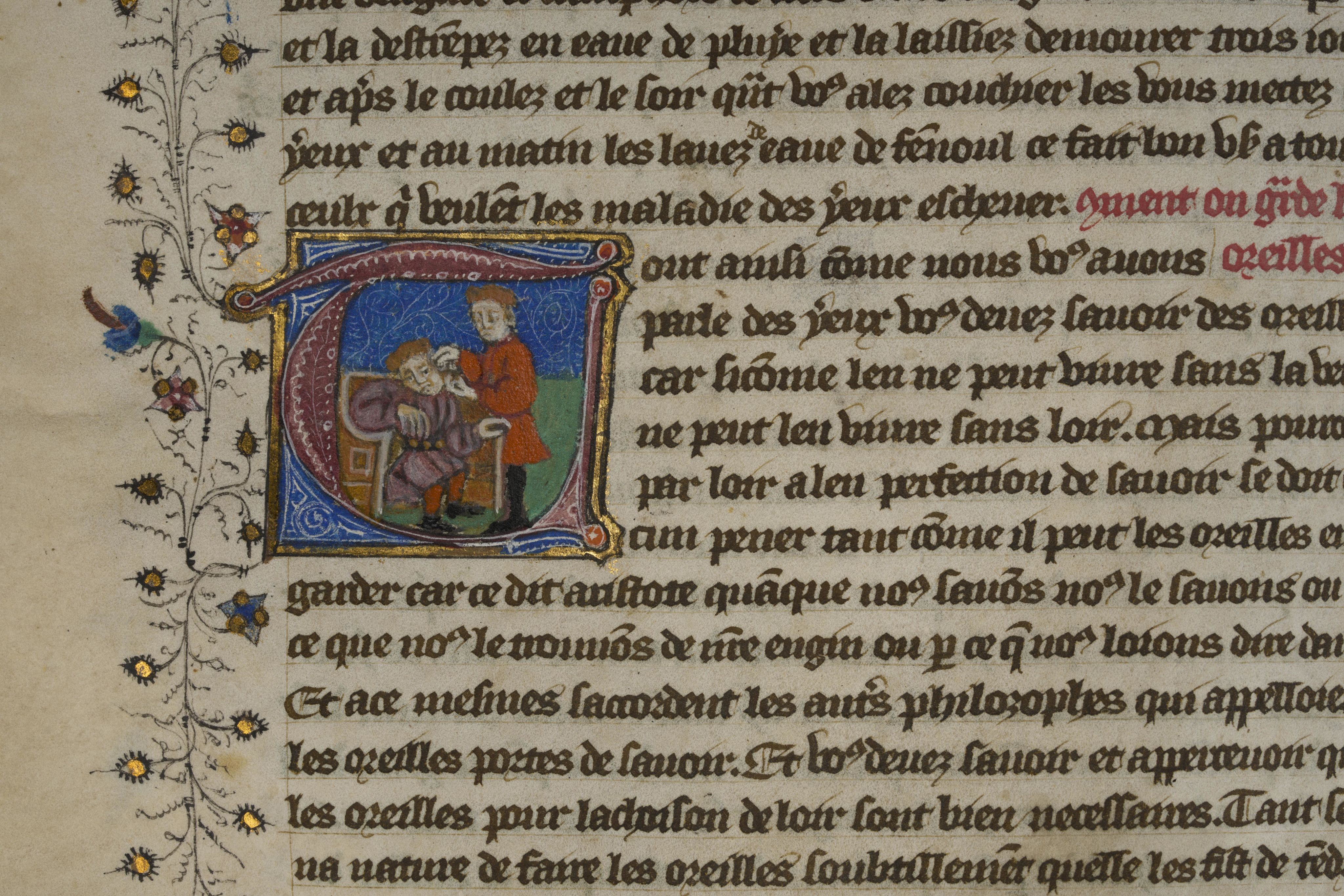 Two figures, one seated and one standing. The standing figure is holding and looking into the left ear of the other.