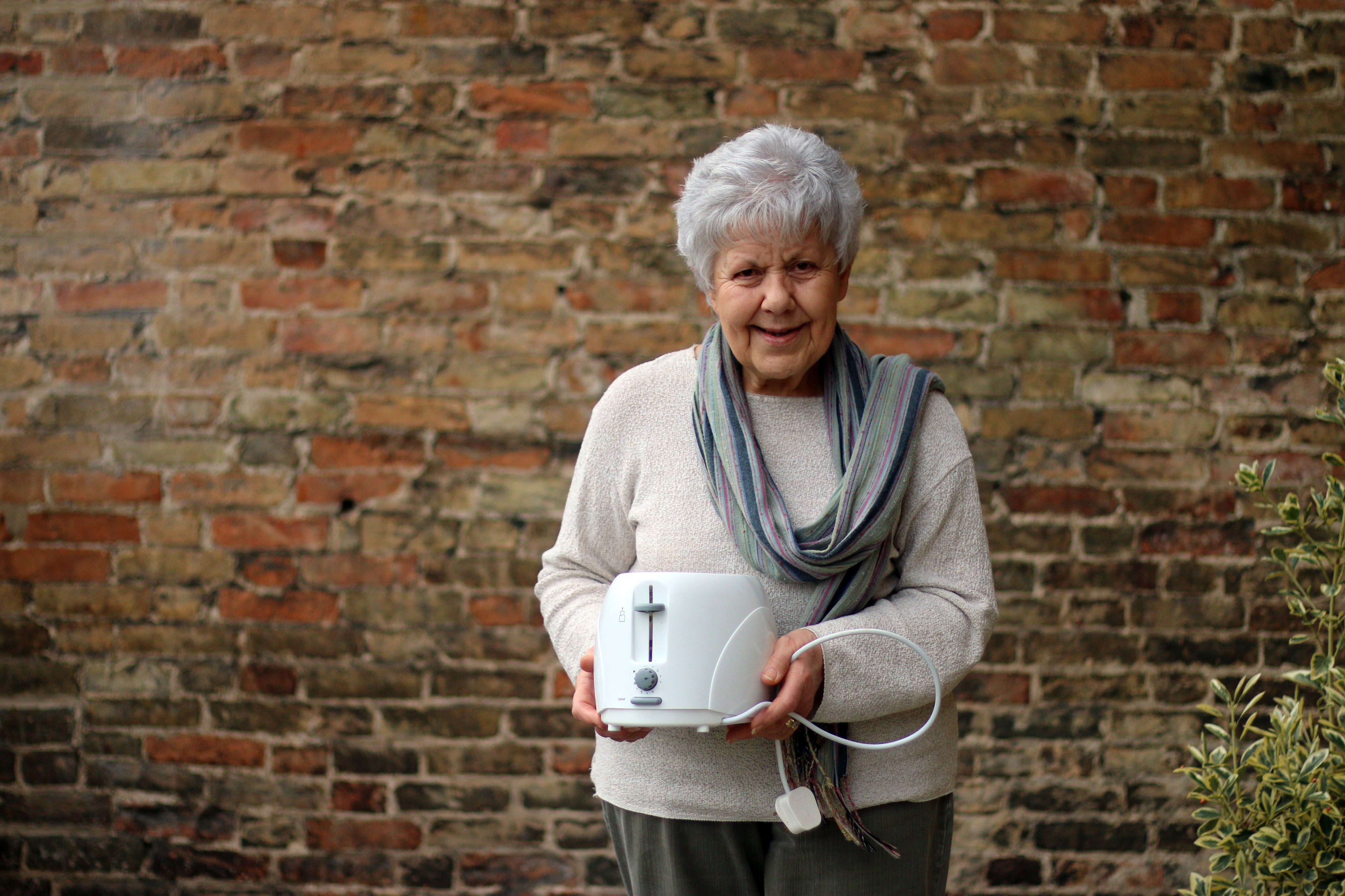 Woman with toaster