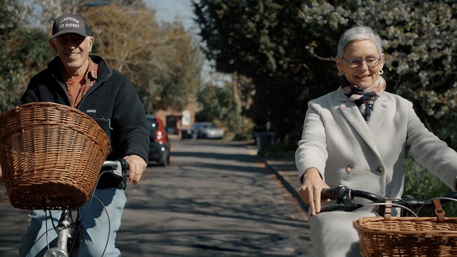 Photo of Bill Harris and Christine Holt cycling