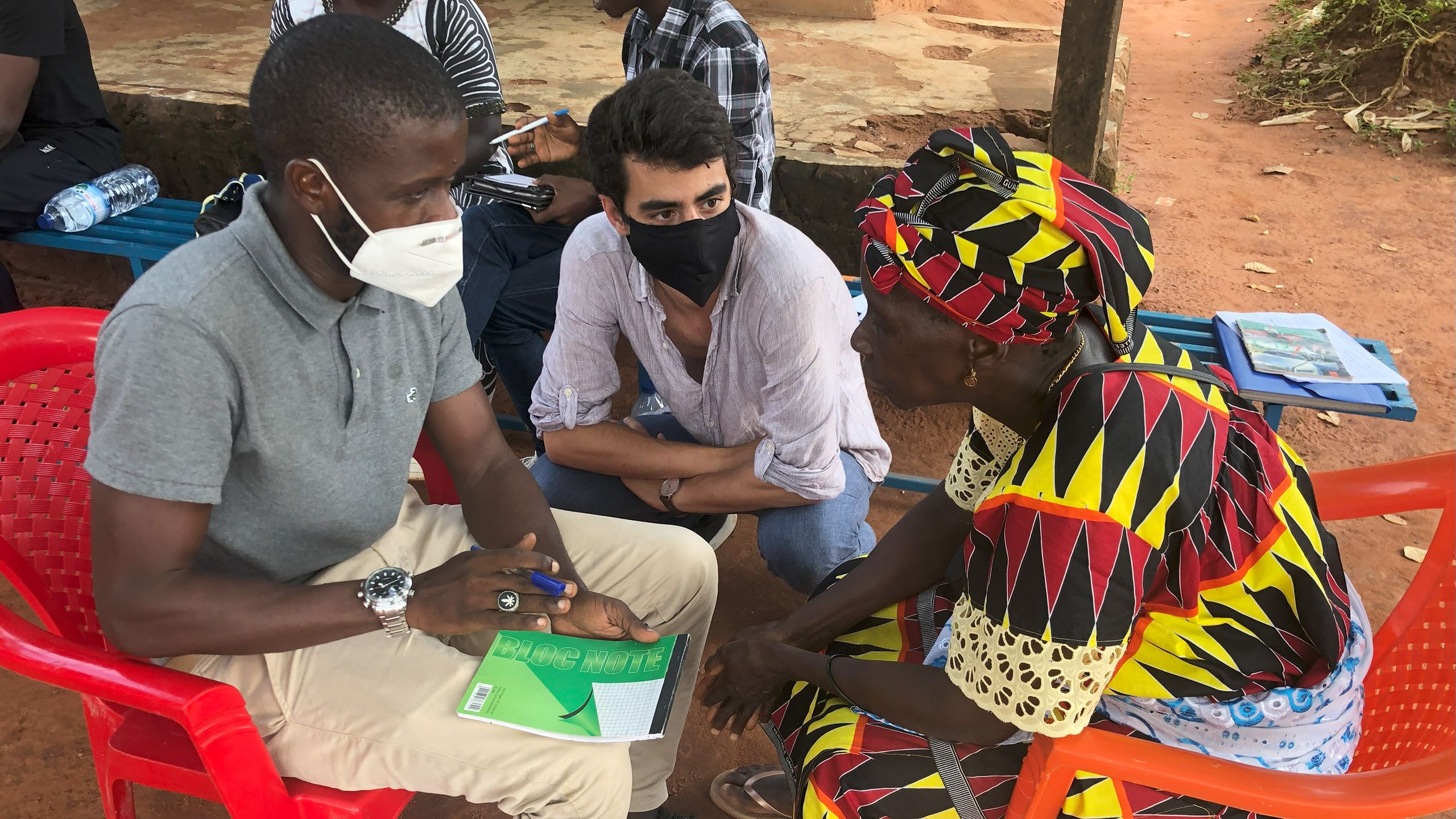 Joao Costa listening to villagers.