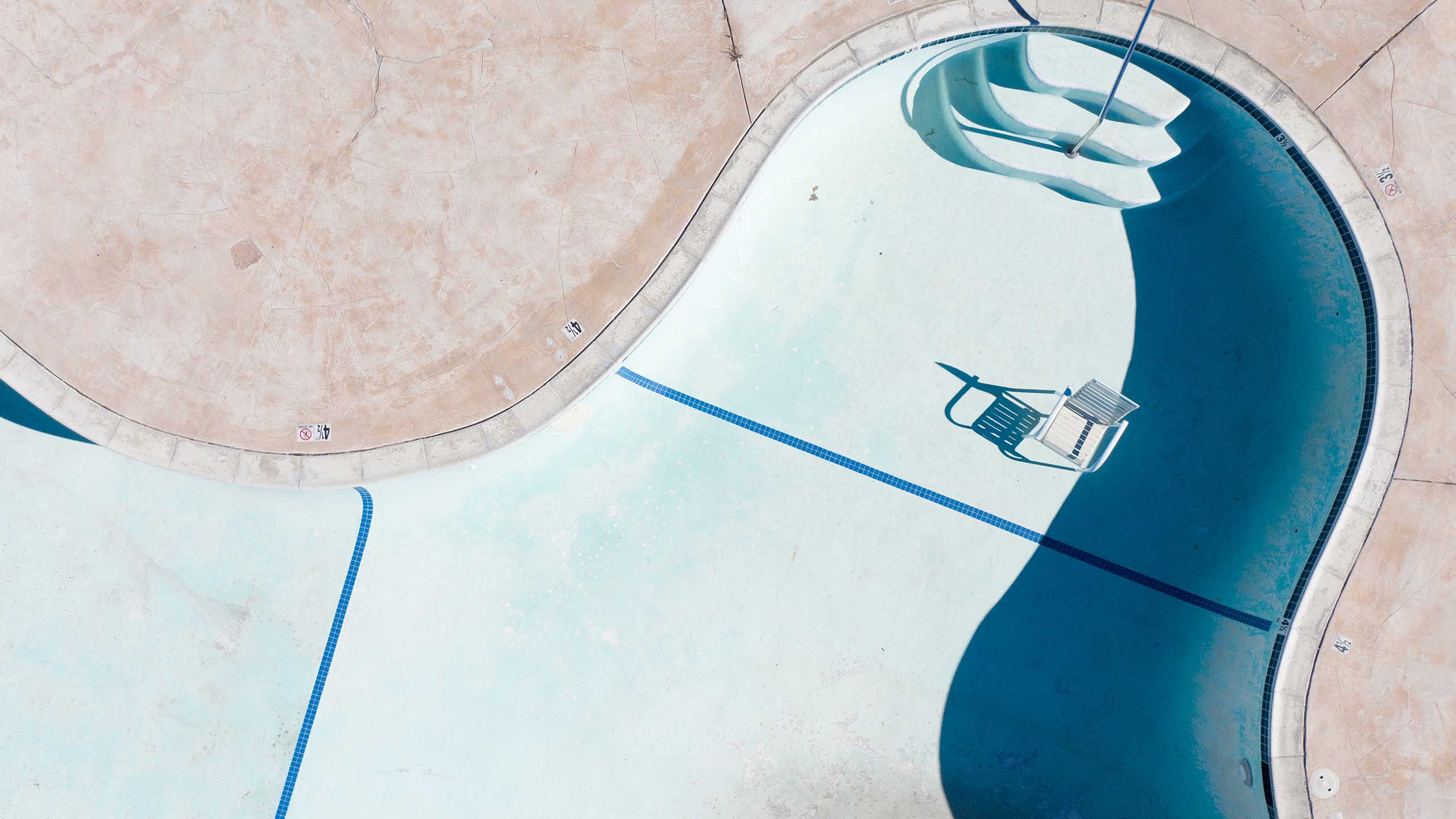 Empty swimming pool photographed by a drone