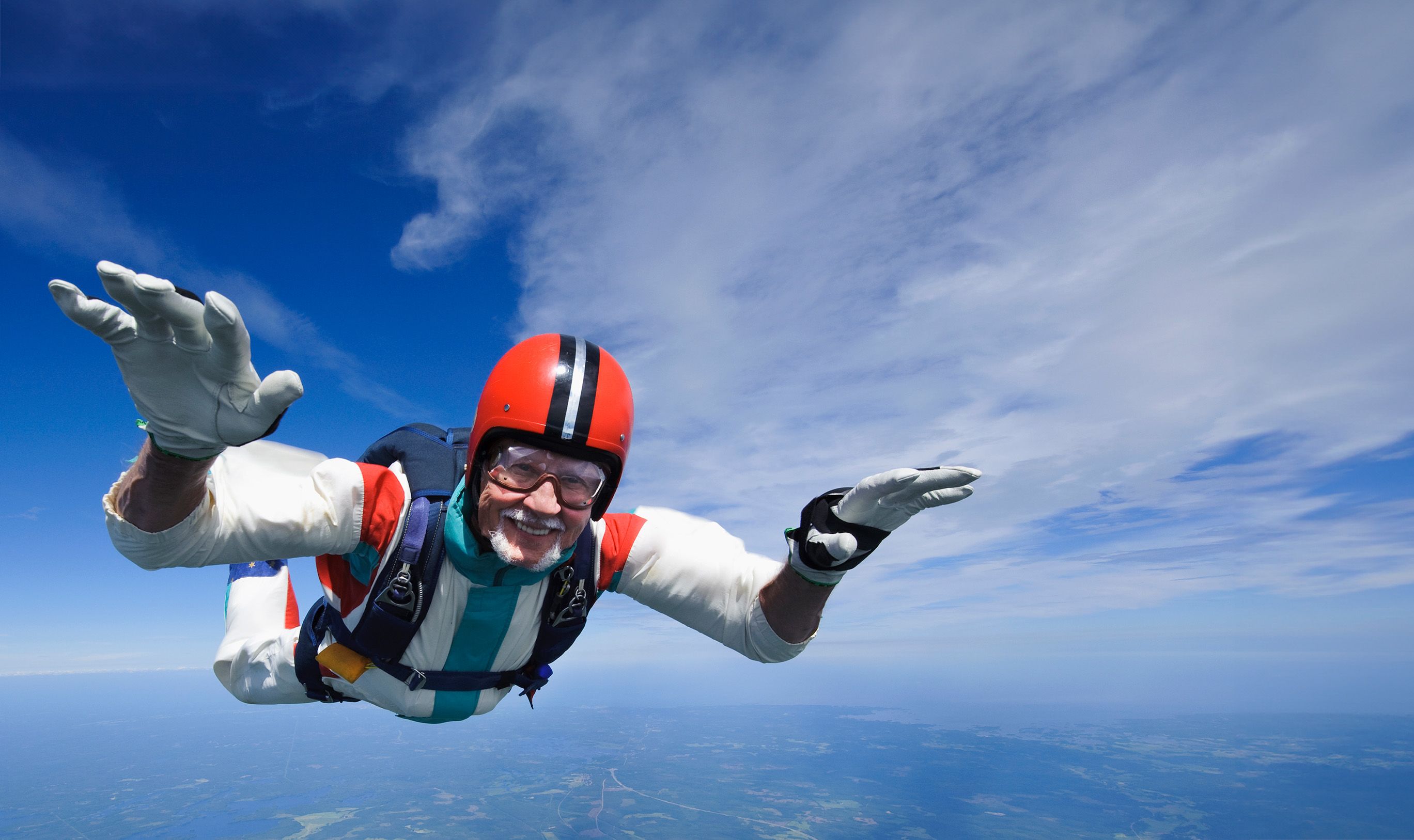 Older man skydiving. Credit Hans Berggren/ Getty