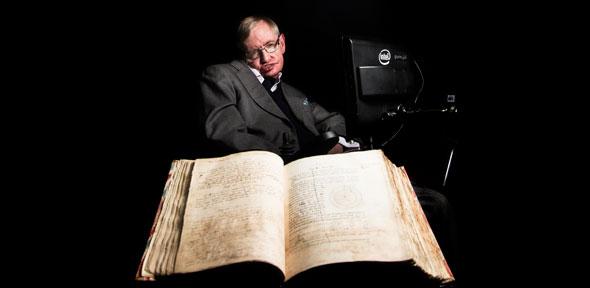 Priceless treasures: in a shot commissioned to celebrate Cambridge University Library’s 600th anniversary, Professor Stephen Hawking is pictured with Newton’s annotated first edition of Principia Mathematica.  Credit: Graham CopeKoga 