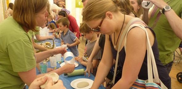 Public Engagement team help adults and children make their own 'fossils'