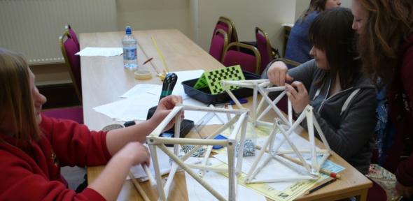 Cromwell Community College students build a truss bridge