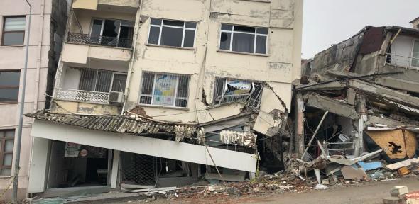 A partially-collapsed building in the aftermath of the Turkey-Syria earthquakes in 2023.