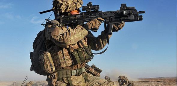 British Army Soldier in Afghanistan Engaging the Enemy