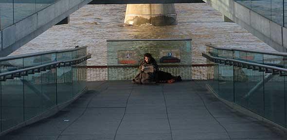 Three faces of London - St Paul's, Millenium Bridge and a homeless man