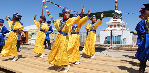 Dancing at the opening of a stupa in Shatta village