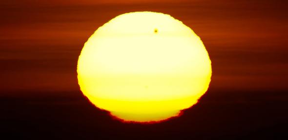 Venus transits the rising Sun
