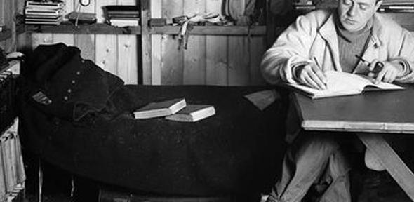 Captain Scott writing his journal during the Terra Nova expedition