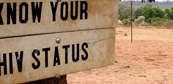 Know your HIV status sign in Simonga village, Zambia.