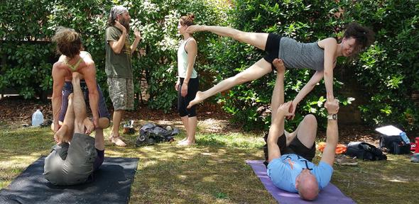 People doing yoga together outdoors in Richmond USA in 2015