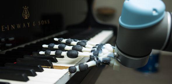 Robot hand playing the piano
