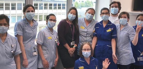 Estee Torok (centre, in black) with team at Addenbrooke's Hospital