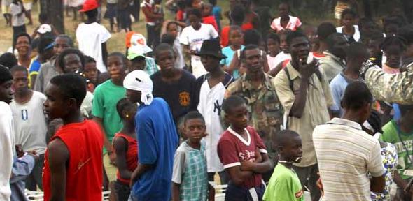 Soldiers set up security and provide aid in Haiti