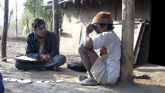 Interviewing a forest villager