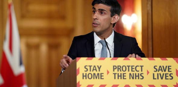 UK Chancellor Rishi Sunak at a Covid-19 press conference. Sunak is credited with instigating the UK's 'furlough' job retention scheme. 