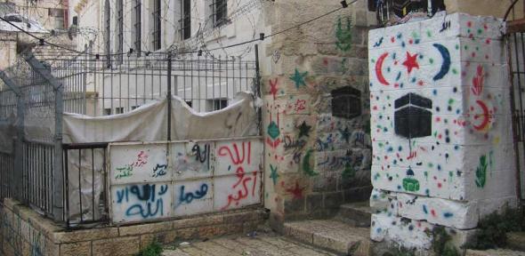 Palestinian Hajj paintings by the entrance to a reconstructed Synagogue in the Muslim Quarter of Jerusalem’s Old City.