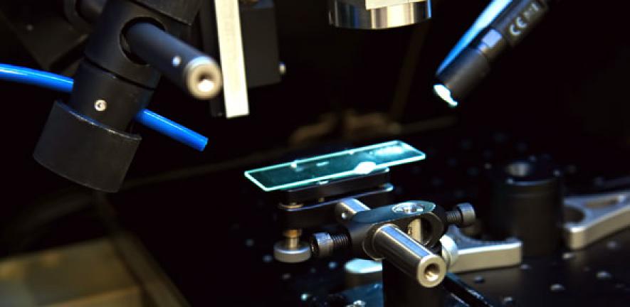 Ultrafast laser etching of glass for microfluidic systems