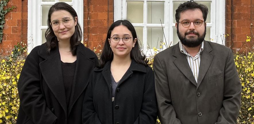 From left, Zeynep Olgun, Elif Yumru, and Mehmet Dogar, who are all History PhD students from Turkey