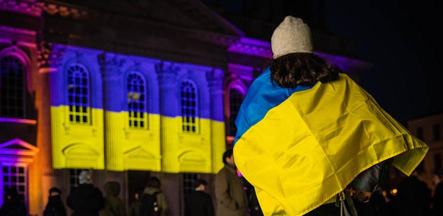 A participant at the University's vigil for Ukraine earlier this year. 