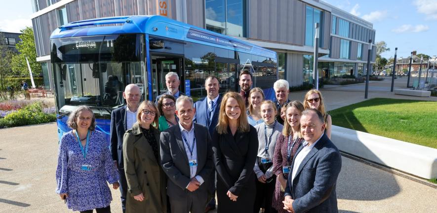 Members of the University team who have worked to bring new electric buses to the Universal service